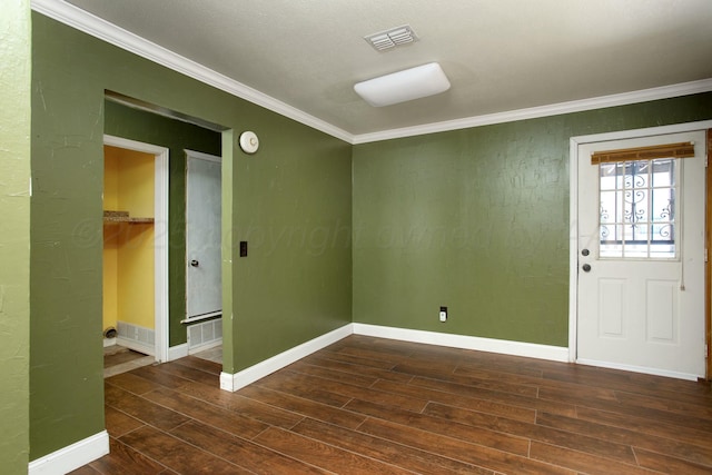 interior space featuring dark hardwood / wood-style flooring and crown molding