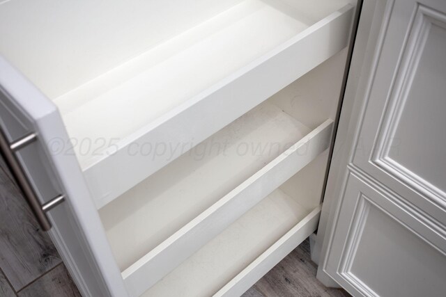 interior details featuring wood finished floors