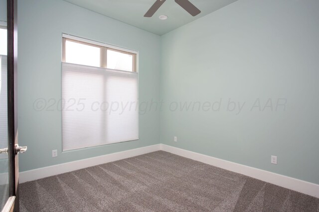 empty room featuring ceiling fan, baseboards, and carpet flooring
