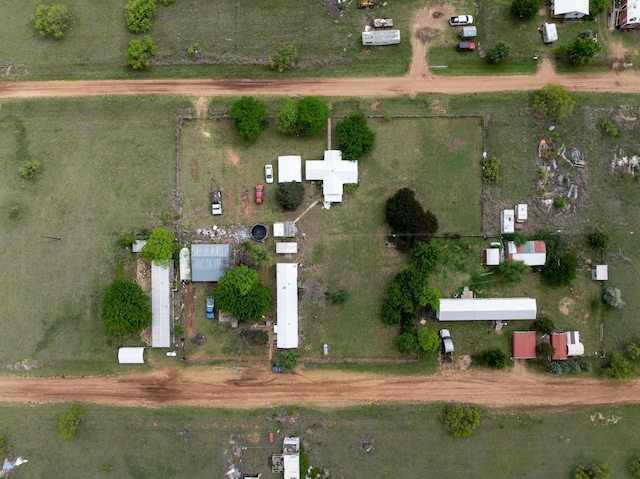 birds eye view of property featuring a rural view