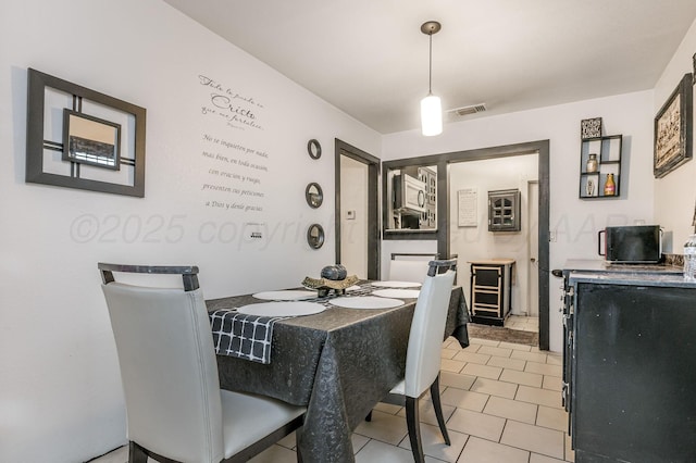 131 S Nelson St, Pampa, TX 79065 - dining area with light tile patterned floors
