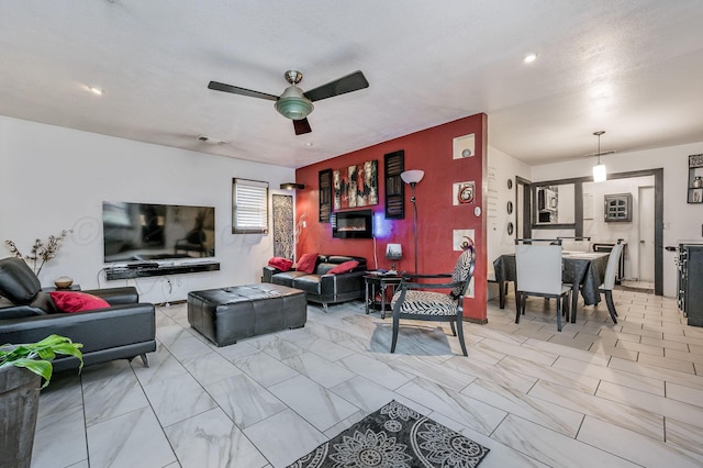 131 S Nelson St, Pampa, TX 79065 - living room with a ceiling fan, light marble finish flooring, and recessed lighting