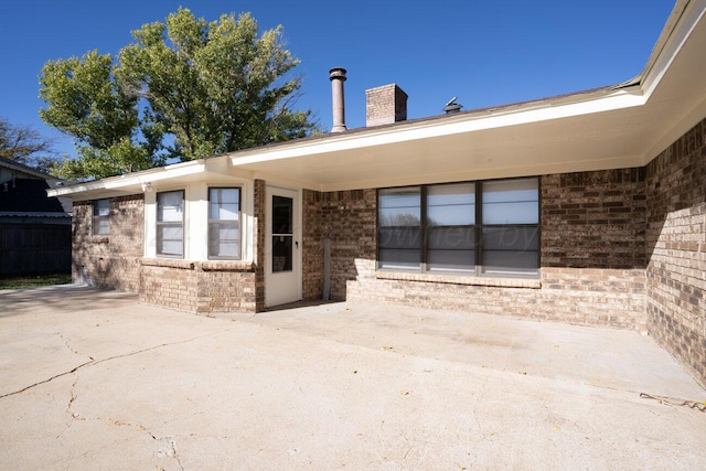 rear view of house featuring a patio area