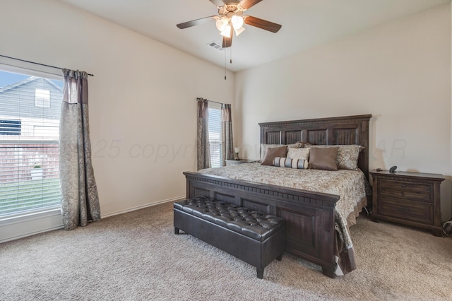 7404 Sinclair St, Amarillo, TX 79119 - carpeted bedroom featuring multiple windows, a ceiling fan, and baseboards