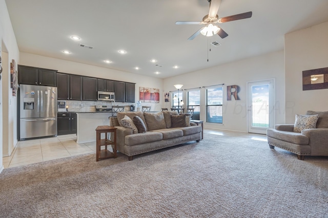 7404 Sinclair St, Amarillo, TX 79119 - living room featuring light carpet, ceiling fan, recessed lighting, light tile patterned floors, and baseboards