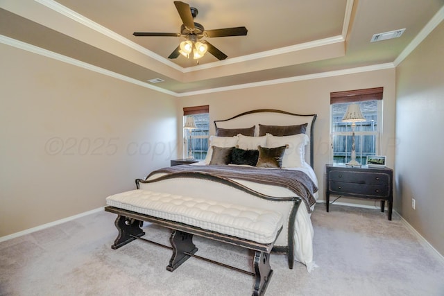 3507 Spokane Ave, Amarillo, TX 79118 - bedroom featuring a tray ceiling, light colored carpet, a ceiling fan, and crown molding