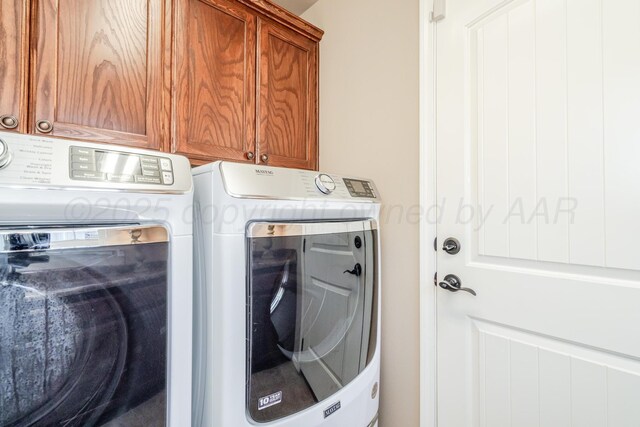 3507 Spokane Ave, Amarillo, TX 79118 - washroom featuring cabinet space and separate washer and dryer