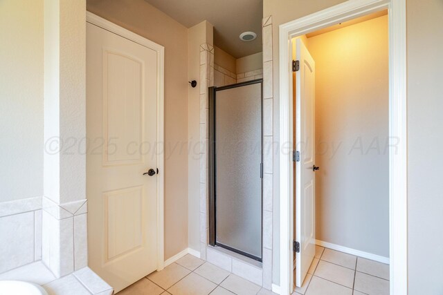 3507 Spokane Ave, Amarillo, TX 79118 - full bath with a shower stall, tile patterned flooring, and a tub to relax in