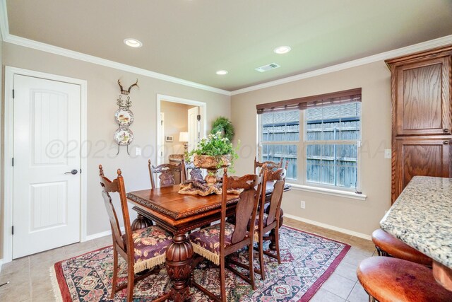 3507 Spokane Ave, Amarillo, TX 79118 - dining room with light tile patterned flooring, crown molding, and recessed lighting