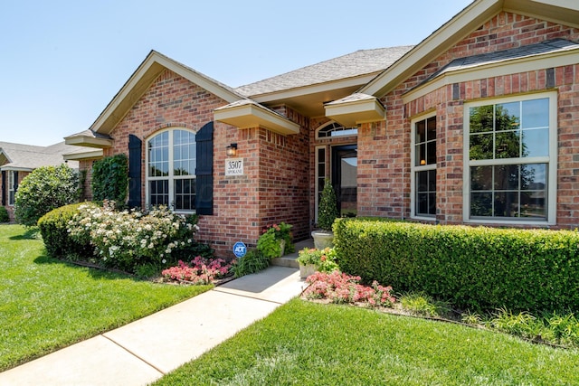 3507 Spokane Ave, Amarillo, TX 79118 - view of front facade with brick siding and a front lawn