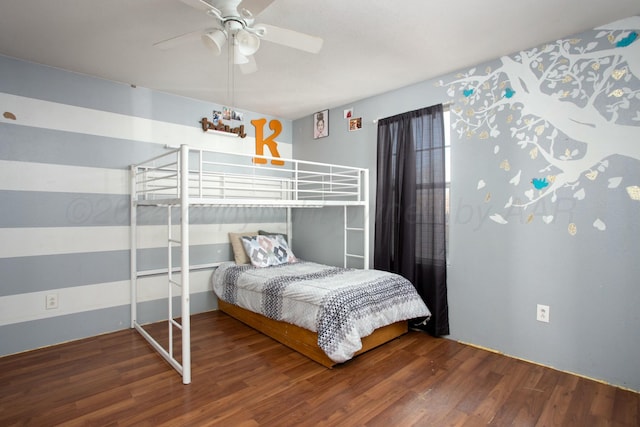 bedroom with wood finished floors and ceiling fan