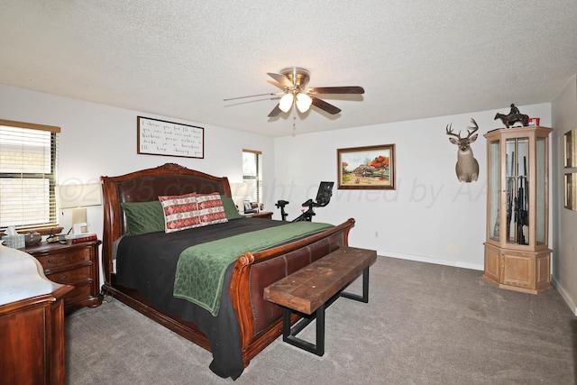 315 Walnut Ave, Panhandle, TX 79068 - carpeted bedroom featuring a textured ceiling and ceiling fan