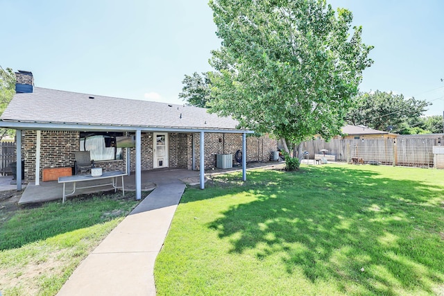315 Walnut Ave, Panhandle, TX 79068 - fenced backyard with a patio