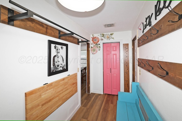 315 Walnut Ave, Panhandle, TX 79068 - doorway to outside featuring wood finished floors and a barn door