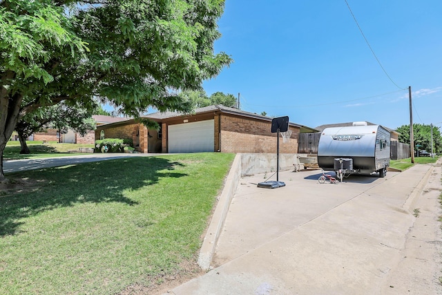 6728 Arroyo Dr, Amarillo, TX 79108 - view of front facade with brick siding, a front yard, and an attached garage