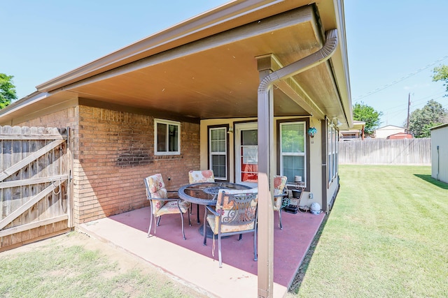 6728 Arroyo Dr, Amarillo, TX 79108 - view of patio with an outdoor fire pit and a gate
