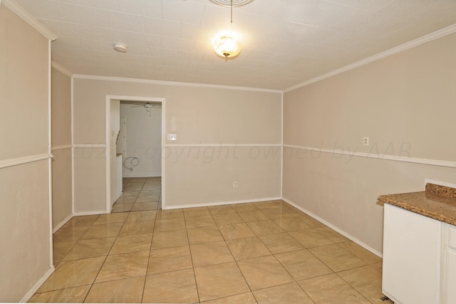 1307 Cooley Dr, Borger, TX 79007 - unfurnished room with ornamental molding, a ceiling fan, light tile patterned flooring, and baseboards