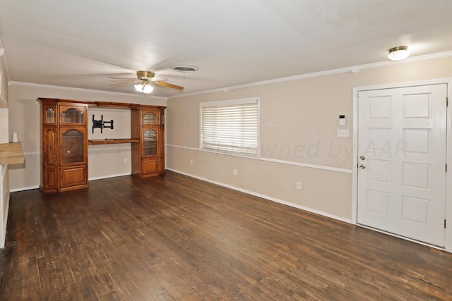 1307 Cooley Dr, Borger, TX 79007 - unfurnished living room featuring a ceiling fan, crown molding, dark wood-style flooring, and baseboards