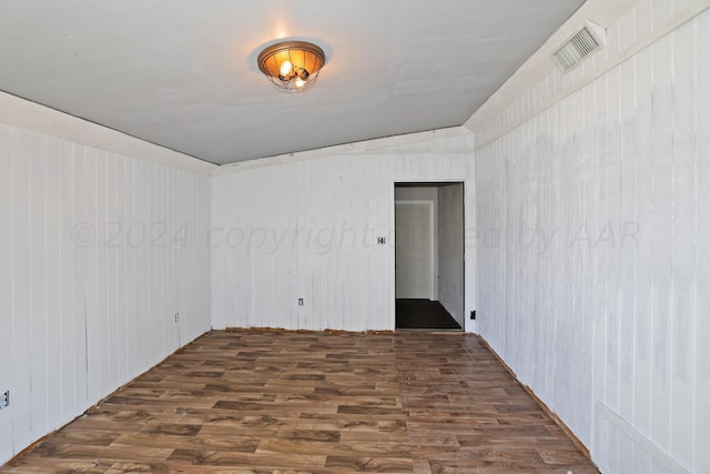 1307 Cooley Dr, Borger, TX 79007 - unfurnished room featuring dark wood finished floors
