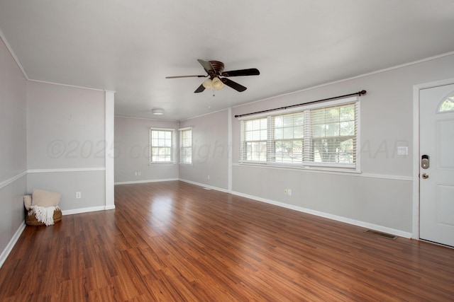 4417 Andrews Ave, Amarillo, TX 79106 - unfurnished room with ceiling fan, wood finished floors, and ornamental molding