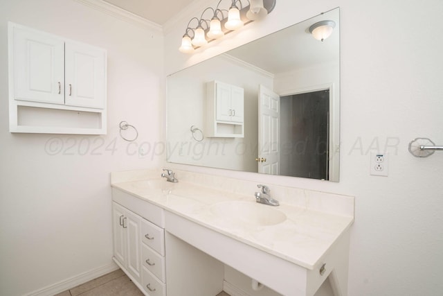 212 S Timbercreek Dr, Amarillo, TX 79118 - bathroom with crown molding, double vanity, baseboards, and tile patterned floors