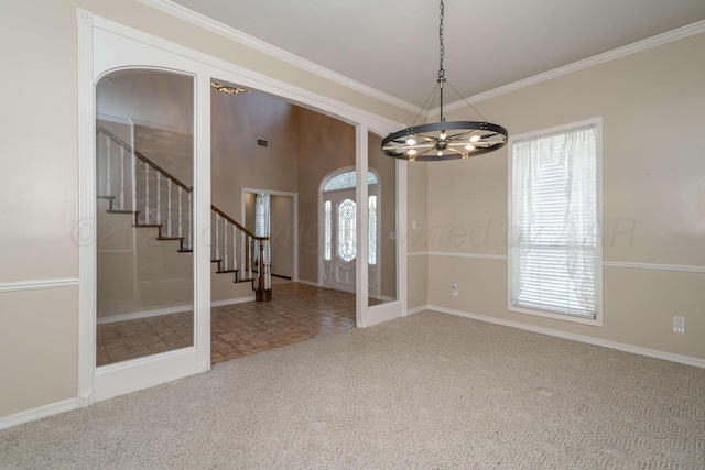 212 S Timbercreek Dr, Amarillo, TX 79118 - carpeted entrance foyer with a chandelier, stairway, crown molding, and baseboards