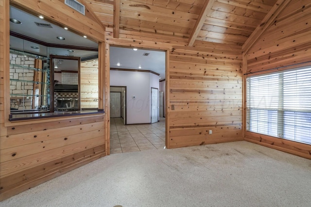 212 S Timbercreek Dr, Amarillo, TX 79118 - tiled spare room featuring wooden ceiling, wooden walls, and carpet flooring