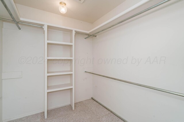 212 S Timbercreek Dr, Amarillo, TX 79118 - unfurnished living room with carpet, baseboards, a brick fireplace, ceiling fan, and recessed lighting