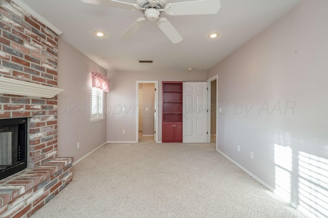 212 S Timbercreek Dr, Amarillo, TX 79118 - unfurnished living room featuring baseboards, a fireplace, carpet, a ceiling fan, and recessed lighting