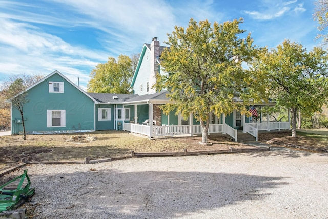 212 S Timbercreek Dr, Amarillo, TX 79118 - view of front of house with a porch and a chimney