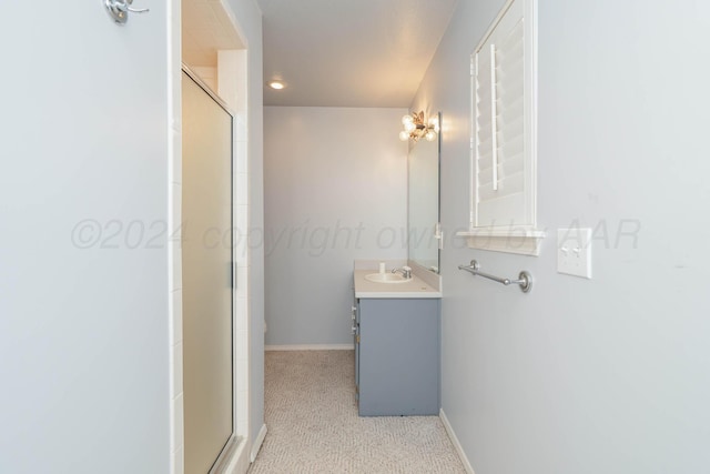 212 S Timbercreek Dr, Amarillo, TX 79118 - bathroom with baseboards, vanity, and a shower with door