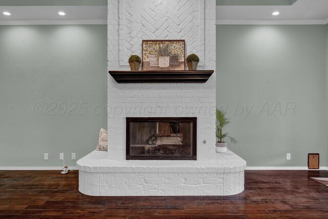 6611 Admiral Ct, Amarillo, TX 79124 - detailed view of ornamental molding, a brick fireplace, wood finished floors, and recessed lighting