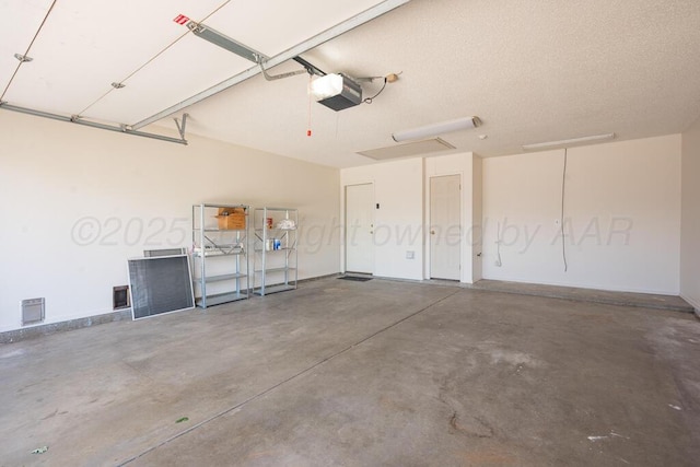 6611 Admiral Ct, Amarillo, TX 79124 - garage featuring a garage door opener