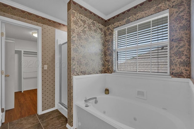 6611 Admiral Ct, Amarillo, TX 79124 - full bath with wallpapered walls, a stall shower, a jetted tub, tile patterned floors, and crown molding