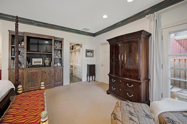 2606 S Lipscomb St, Amarillo, TX 79109 - carpeted bedroom with ensuite bathroom and ornamental molding