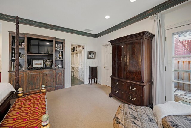 2606 S Lipscomb St, Amarillo, TX 79109 - bedroom with ornamental molding, recessed lighting, connected bathroom, and carpet flooring