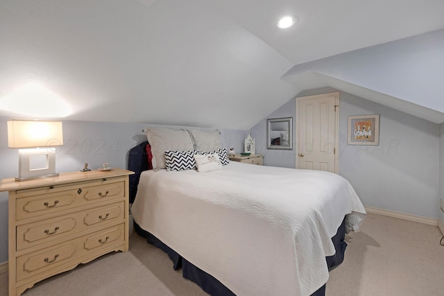 2606 S Lipscomb St, Amarillo, TX 79109 - bedroom with light carpet, lofted ceiling, and baseboards
