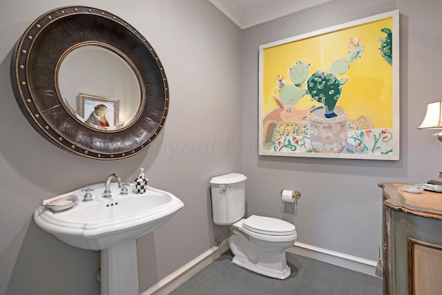 2606 S Lipscomb St, Amarillo, TX 79109 - bathroom featuring toilet and ornamental molding