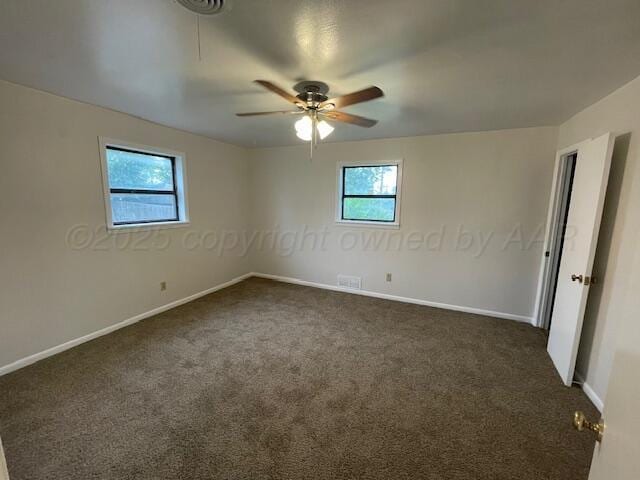 1805 N Jefferson St, Amarillo, TX 79107 - empty room featuring dark colored carpet and ceiling fan
