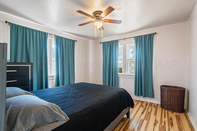 4002 S Tyler St, Amarillo, TX 79110 - bedroom with wood finished floors and a ceiling fan