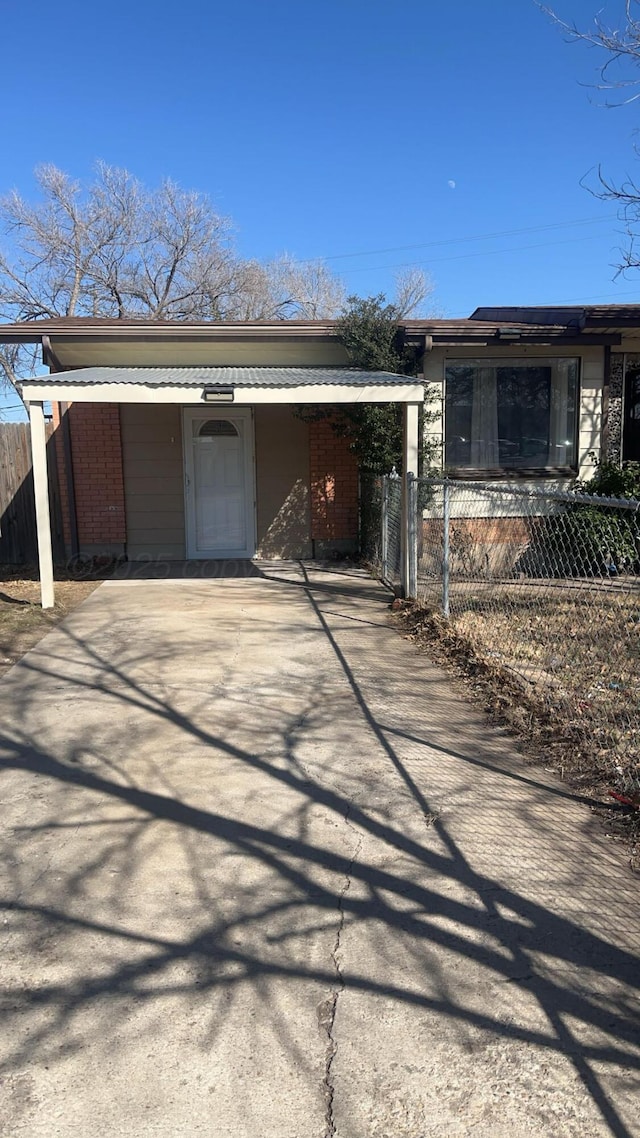 view of front of house with a carport