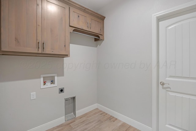 laundry room featuring hookup for a washing machine, baseboards, light wood finished floors, cabinet space, and electric dryer hookup