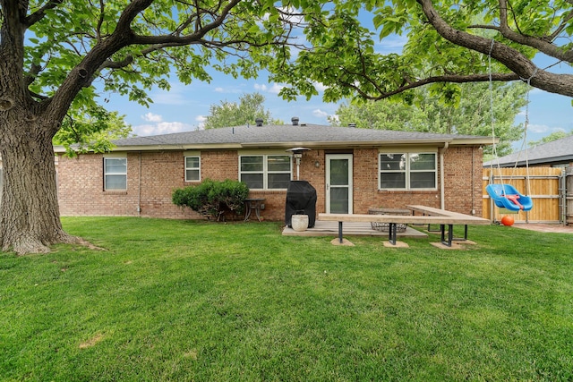 3313 Burrus Pl, Amarillo, TX 79121 - back of property featuring brick siding and a shingled roof