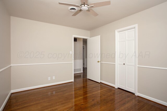 5214 George Ter, Amarillo, TX 79106 - unfurnished bedroom featuring wood finished floors, a closet, and a ceiling fan
