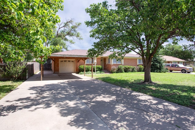 5214 George Ter, Amarillo, TX 79106 - ranch-style home featuring an attached garage, brick siding, and driveway
