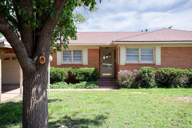 5214 George Ter, Amarillo, TX 79106 - single story home featuring brick siding, a front lawn, and driveway
