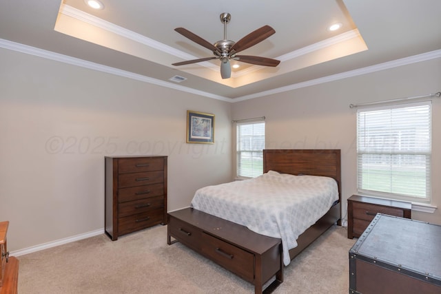 bedroom with a tray ceiling, light carpet, ornamental molding, ceiling fan, and recessed lighting