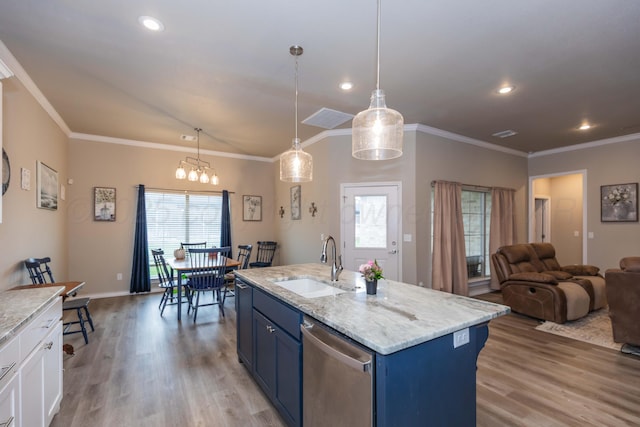 kitchen featuring a sink, blue cabinetry, dishwasher, light wood-type flooring, and ornamental molding