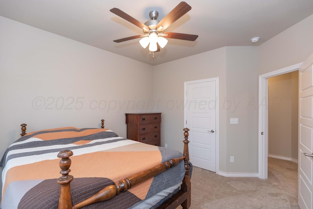 bedroom featuring light carpet, baseboards, and ceiling fan