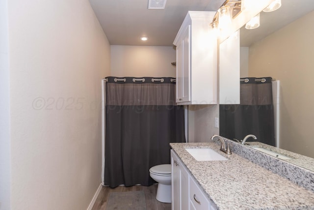 full bathroom with wood finished floors, vanity, toilet, baseboards, and a shower with curtain